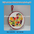 A series of fruit design ceramic pot holders with lifting rope